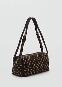 Suede shoulder bag with eyelets