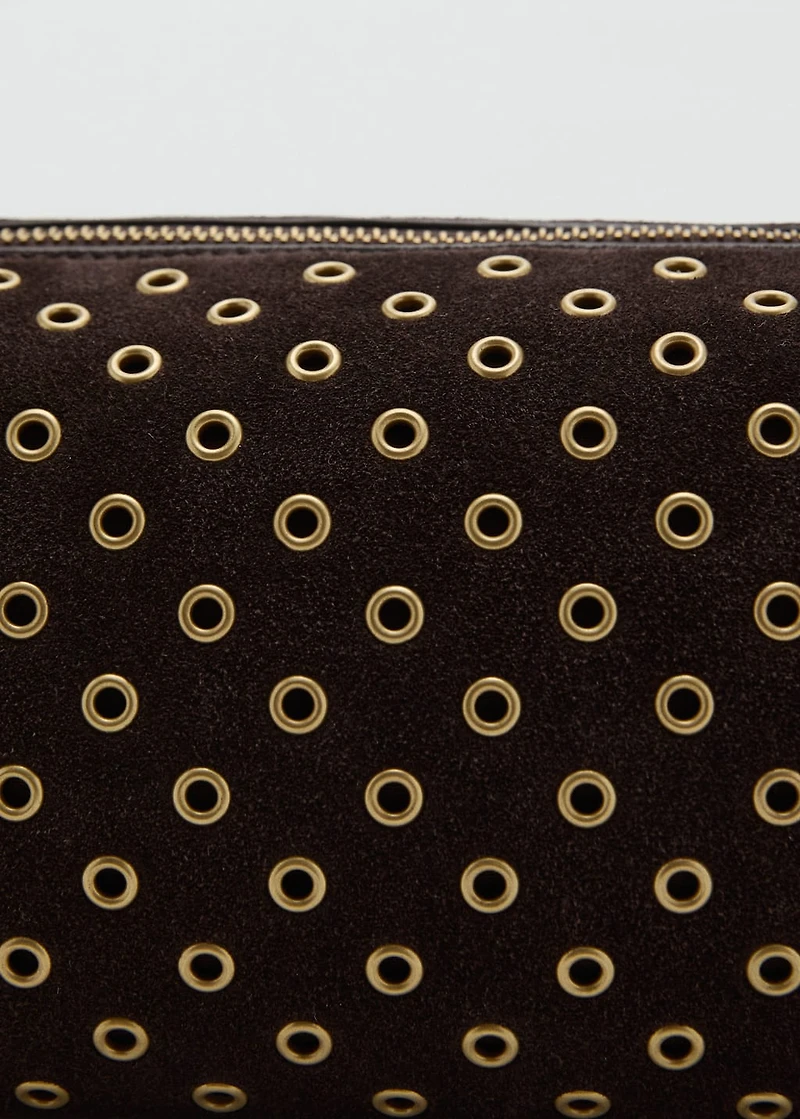 Suede shoulder bag with eyelets