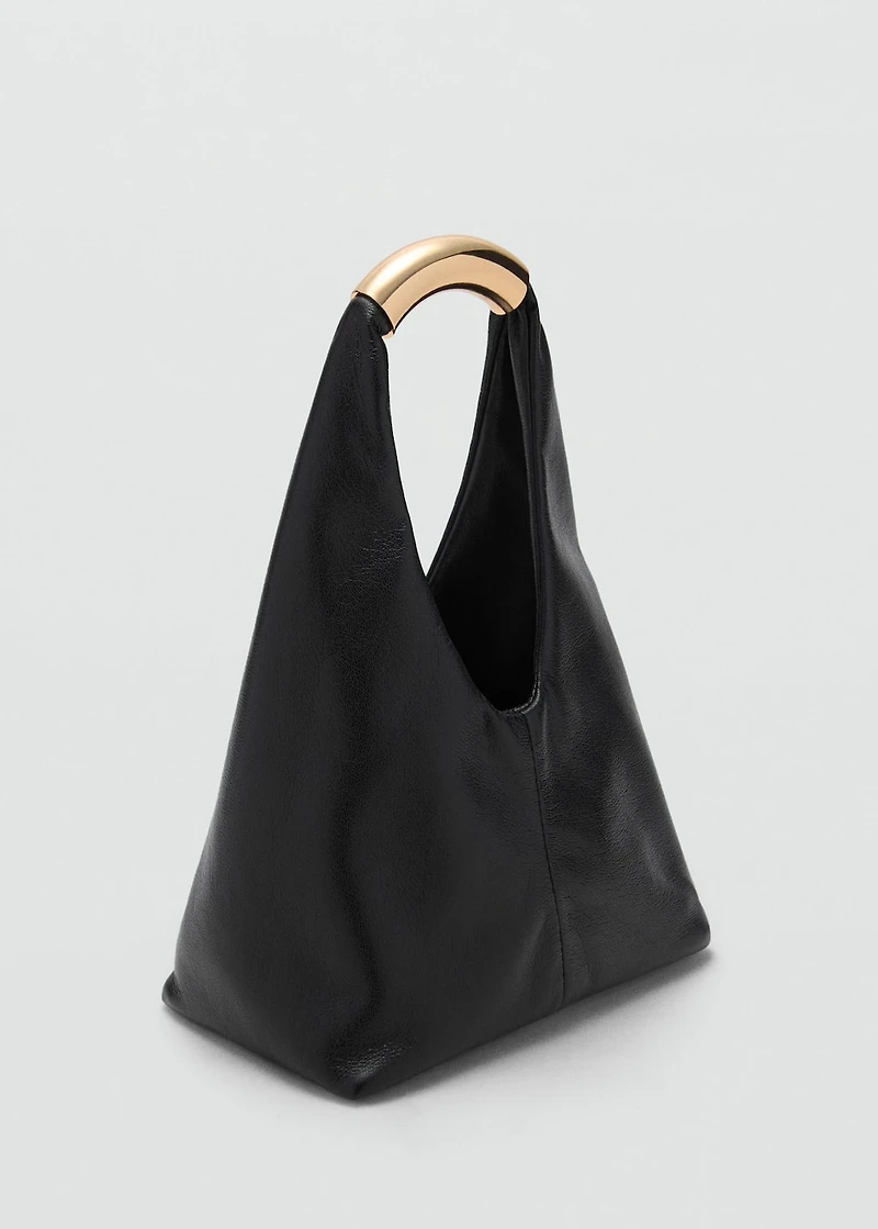 Handbag with metal handle