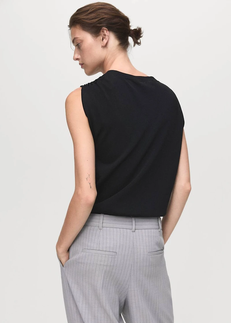 Short-sleeved sweater with metallic detail