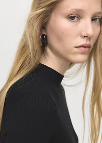 Asymmetrical sweater with buttons