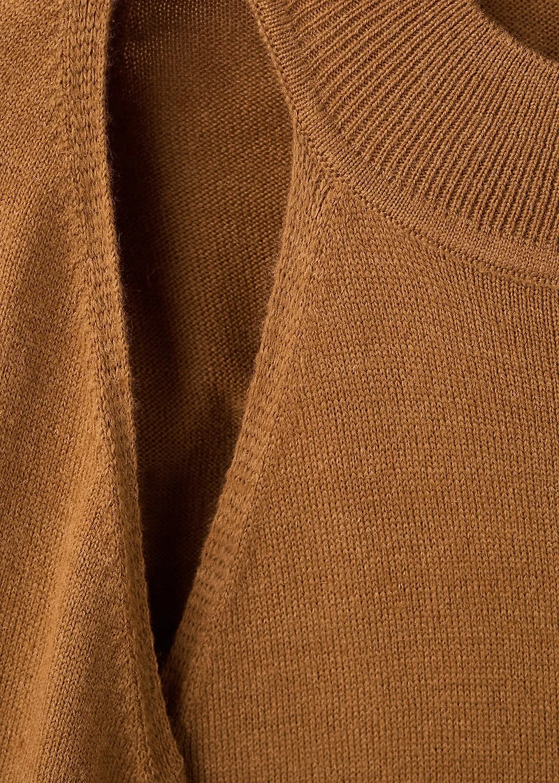 Sweater with cardigan-style detailing