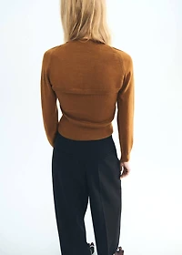 Sweater with cardigan-style detailing
