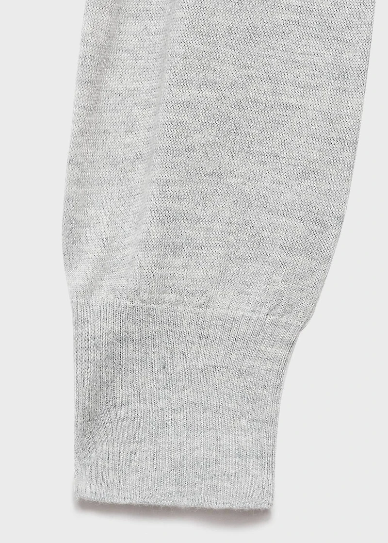 Turtleneck sweater with knot