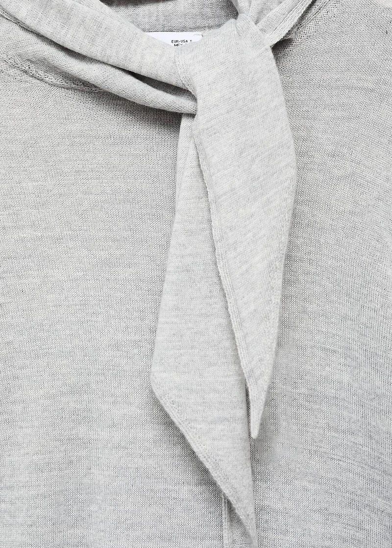 Turtleneck sweater with knot