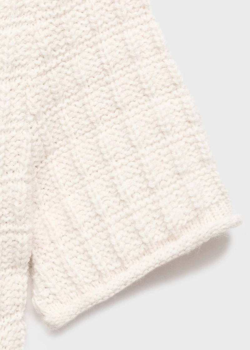 Textured sweater with ruffles