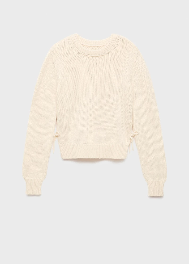 Knitted sweater with tie slits