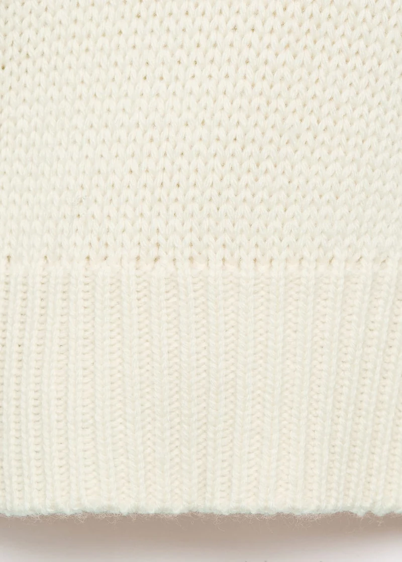 Knitted sweater with tie slits