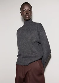Cable-knit turtleneck sweater