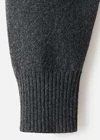 Cable-knit turtleneck sweater