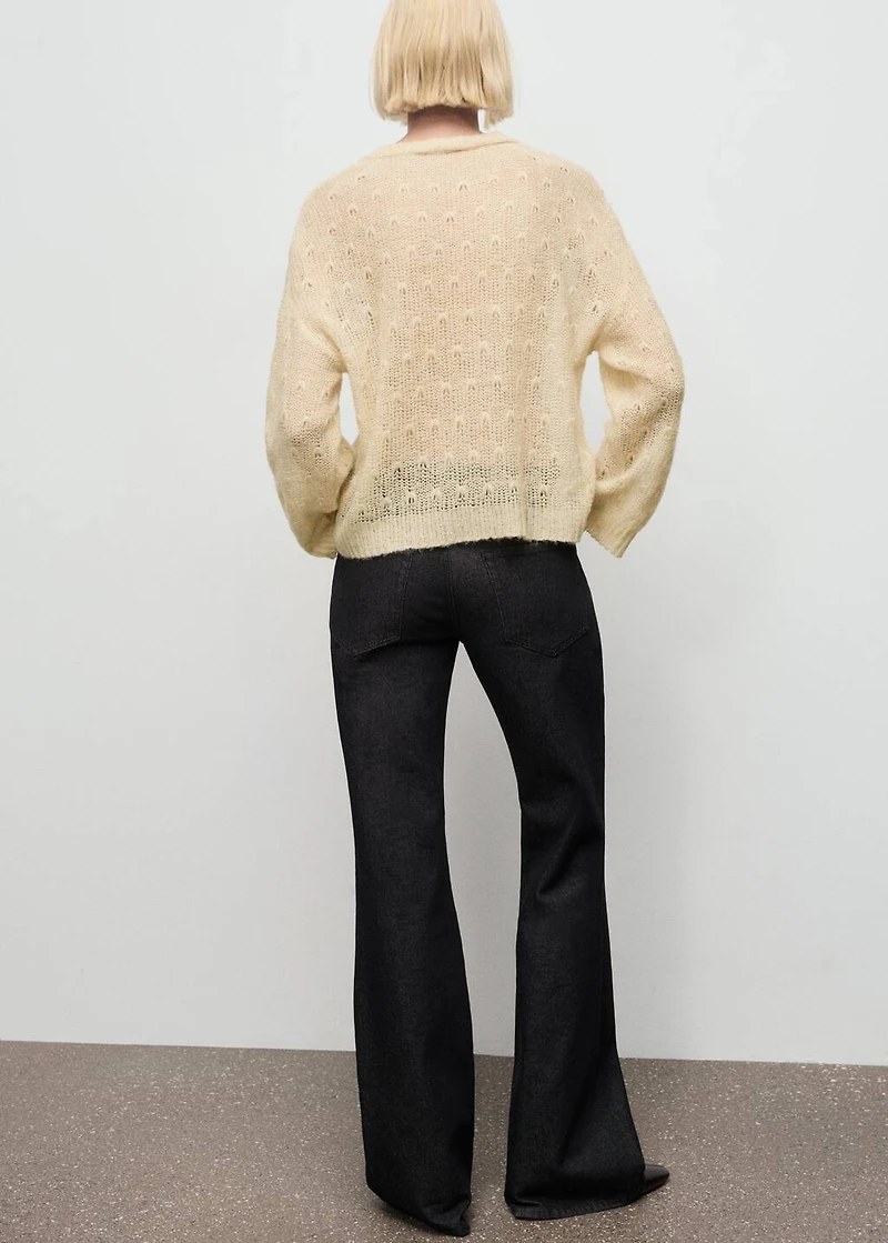 Knit sweater with lace pattern