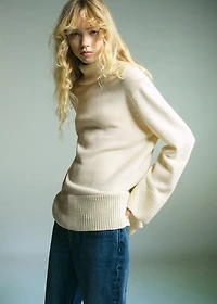 Turtleneck sweater with slits