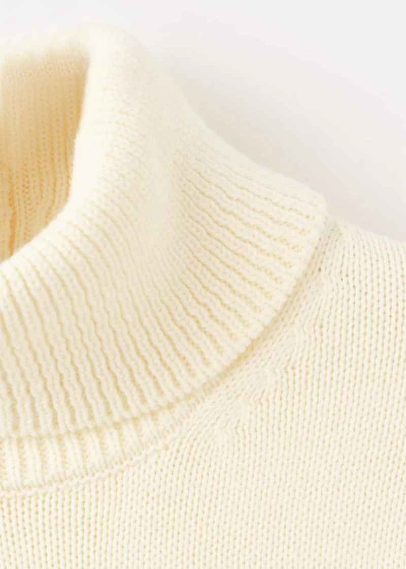 Turtleneck sweater with slits