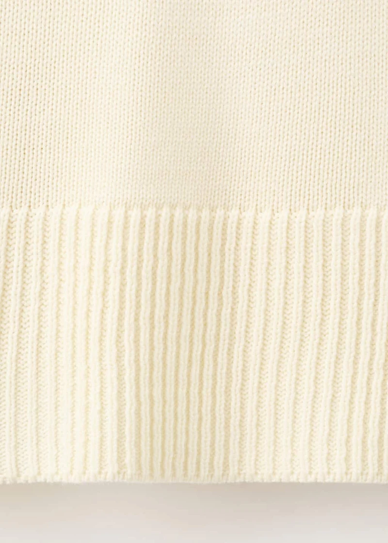 Turtleneck sweater with slits