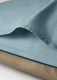 Reversible percale cotton pillowcase with contrasting piping 50x75 cm