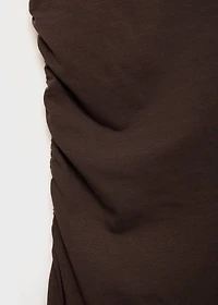 Asymmetrical dress with gathered strap