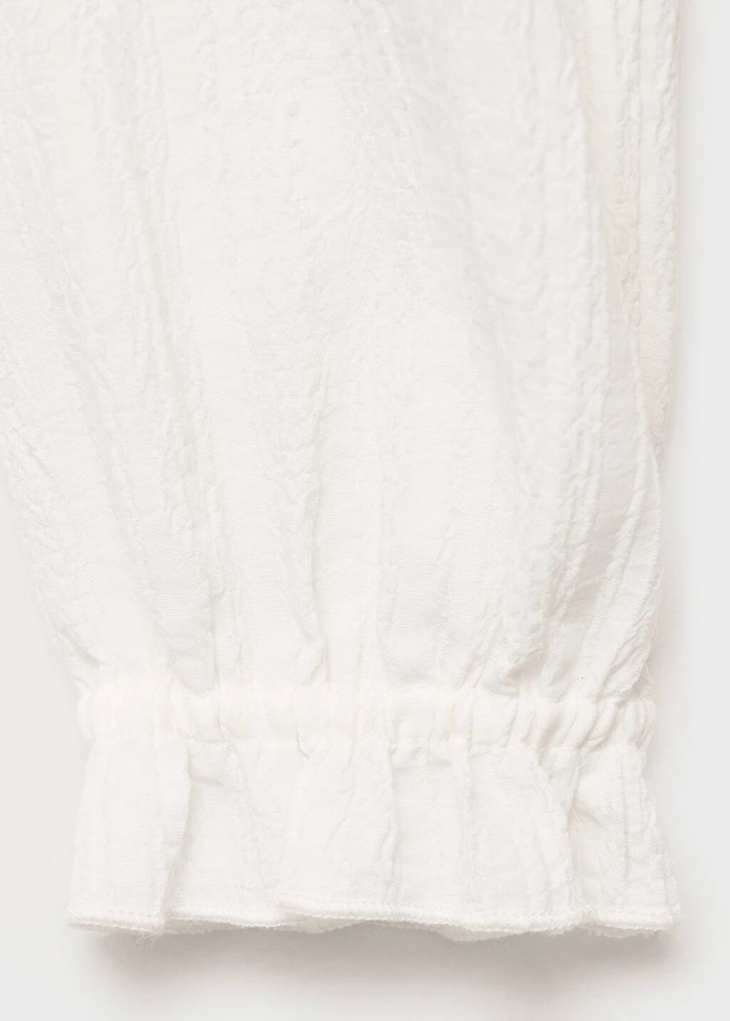 Ruffled cross blouse