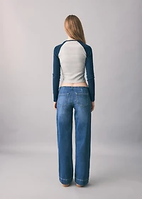 Low-waist studded jeans