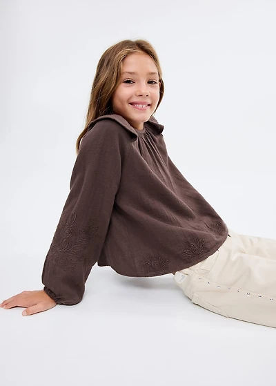 Ruffled embroidered blouse