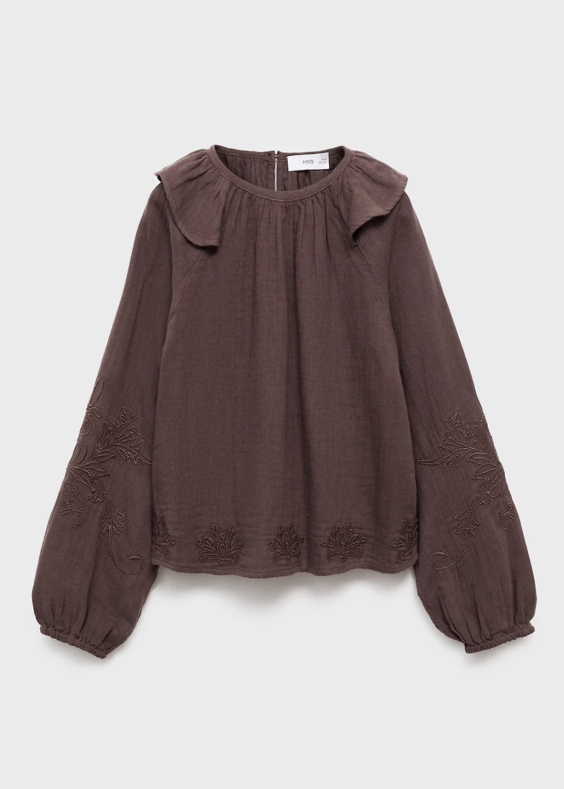 Ruffled embroidered blouse