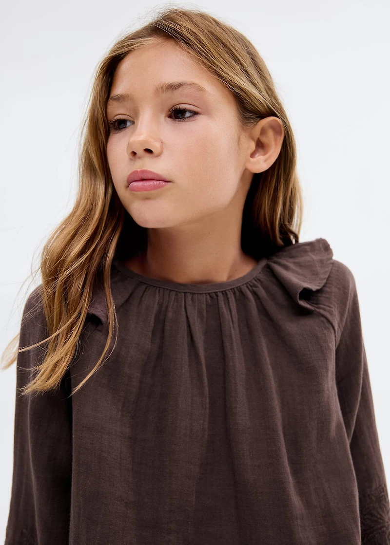 Ruffled embroidered blouse