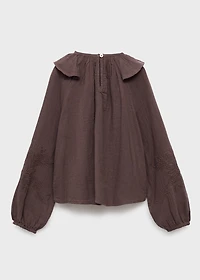 Ruffled embroidered blouse