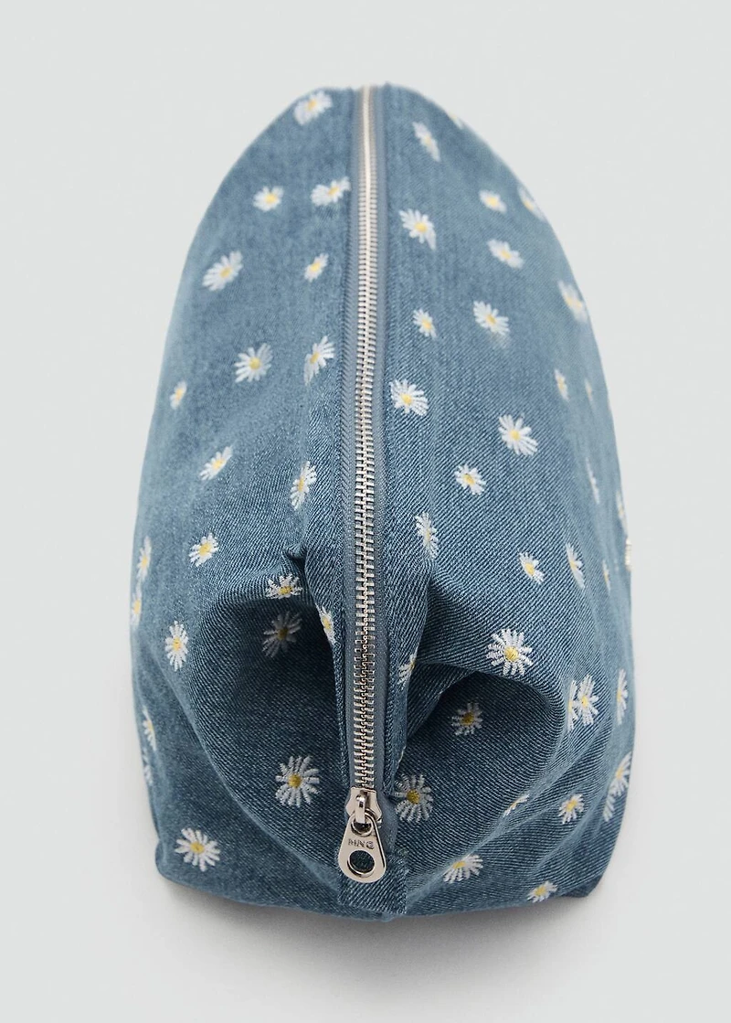 Denim toiletry bag embroidered with flowers