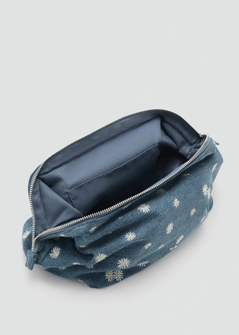 Denim toiletry bag embroidered with flowers