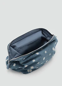 Denim toiletry bag embroidered with flowers