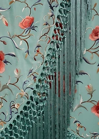 Asymmetrical dress with embroidered fringes