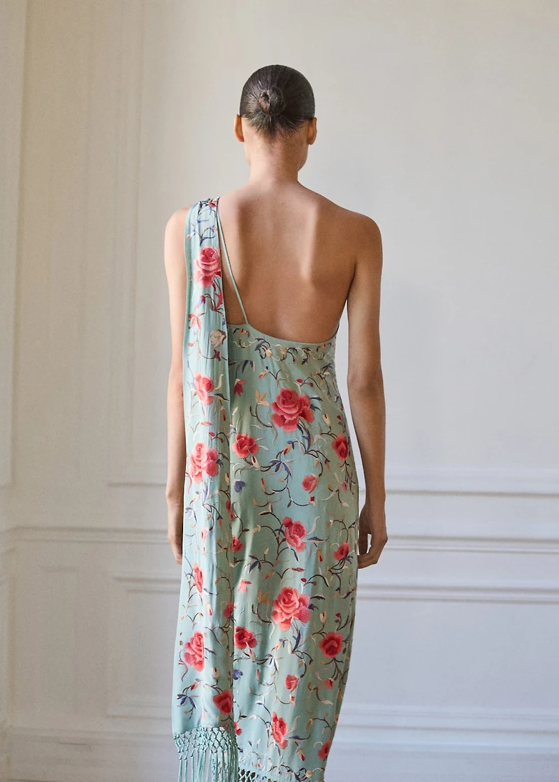 Asymmetrical dress with embroidered fringes