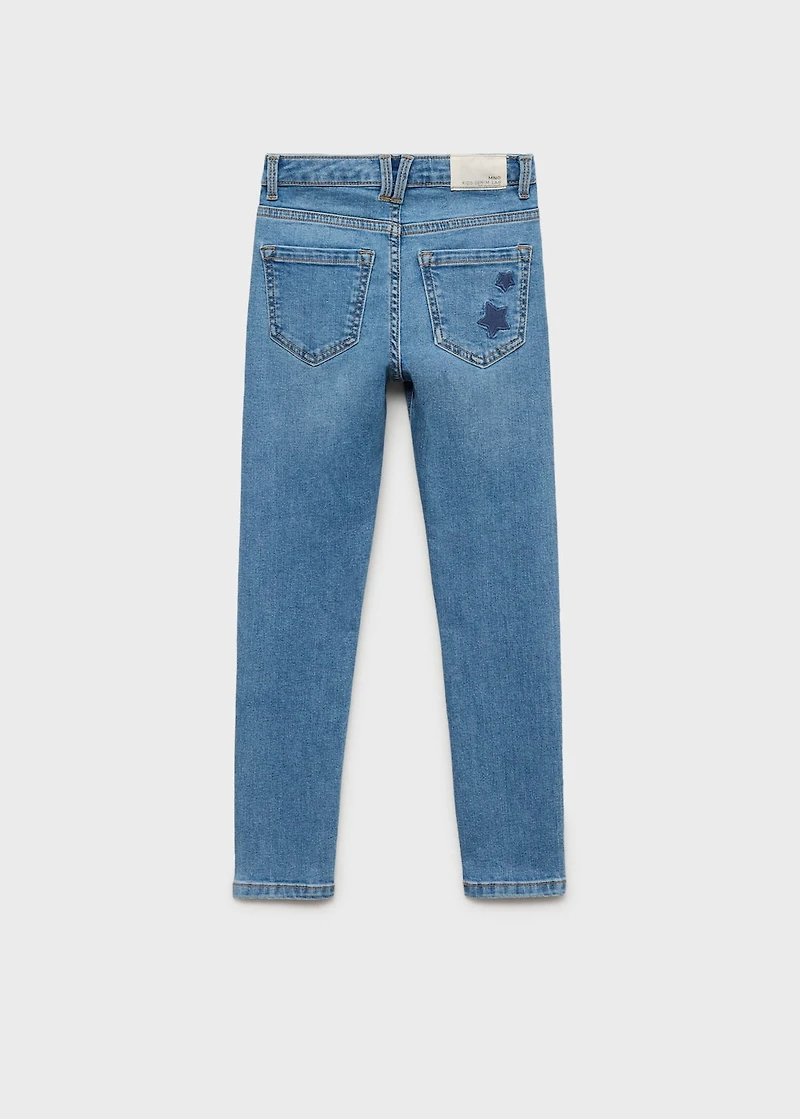 Star-embroidered skinny jeans