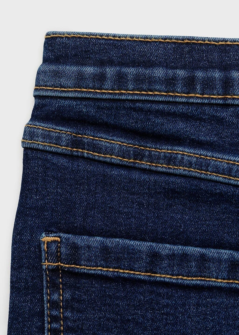 Frayed low-rise skinny jeans