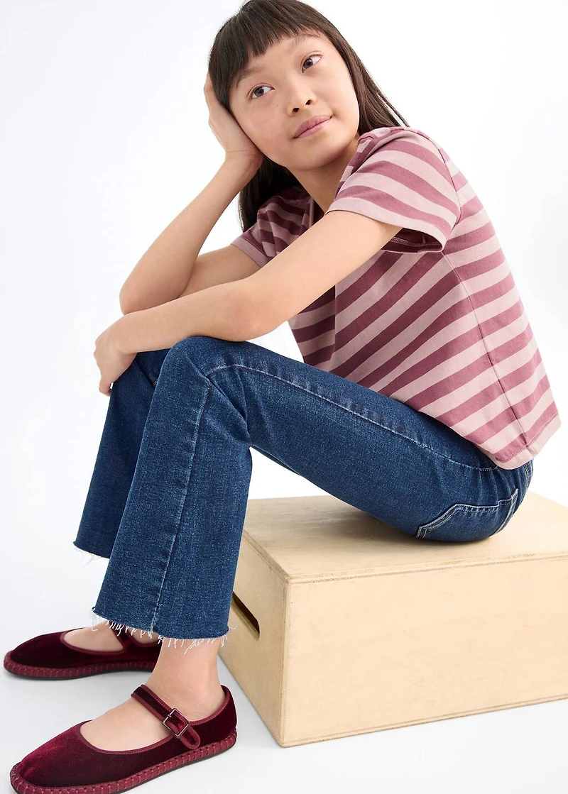 Frayed low-rise skinny jeans