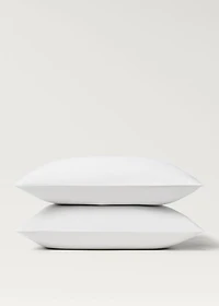 Two 500-thread count cotton percale pillowcases with rounded piping detail 60x60 cm