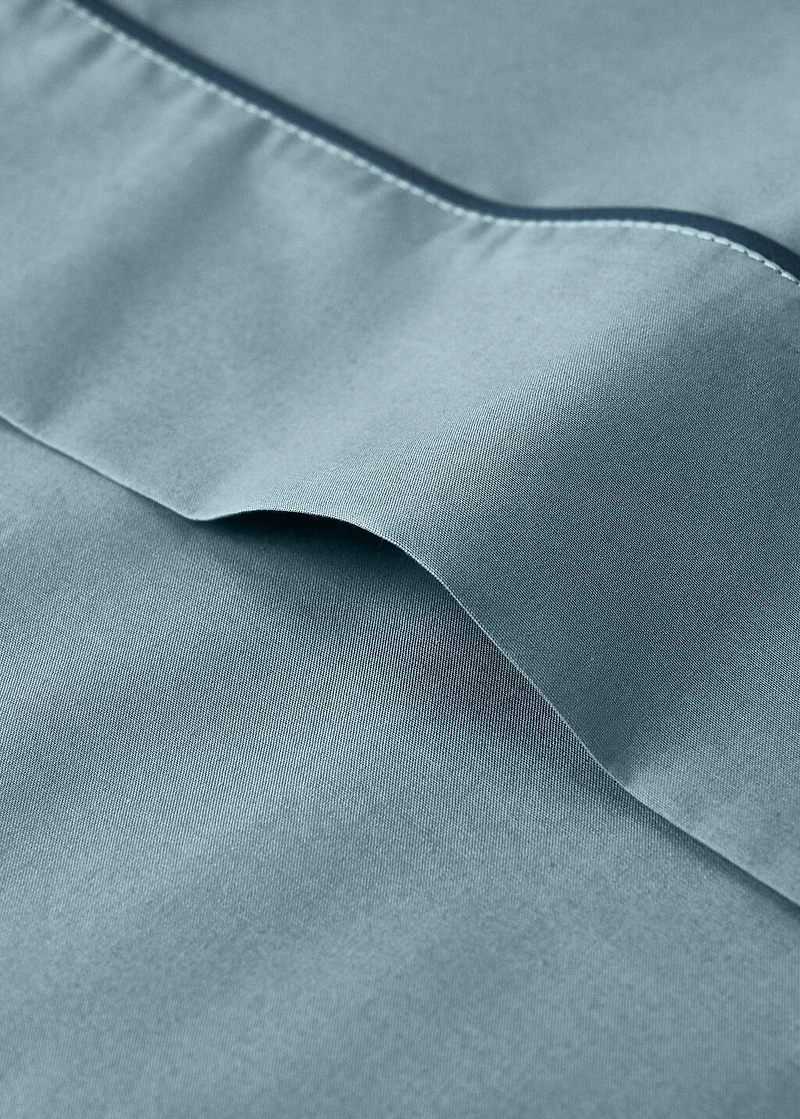Reversible percale cotton top sheet with contrasting piping for 90 cm bed
