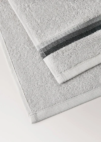 Washbasin towel with striped trim