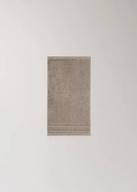 Cotton guest towel with embroidered dots