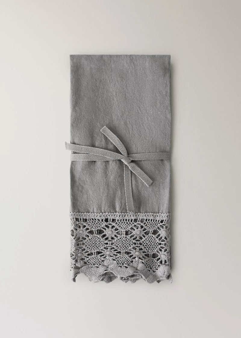Linen towel with lace edging