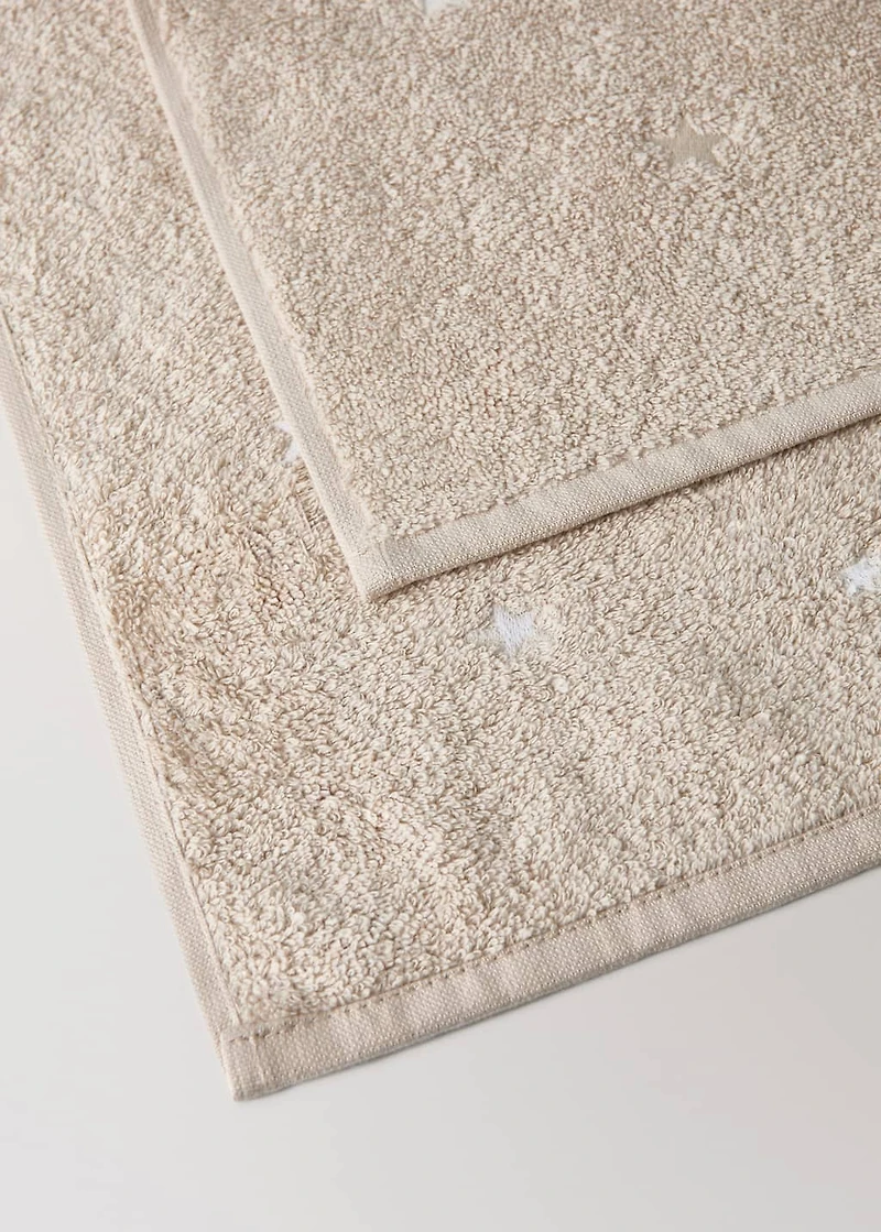 Children's bath towel with glow-in-the-dark stars