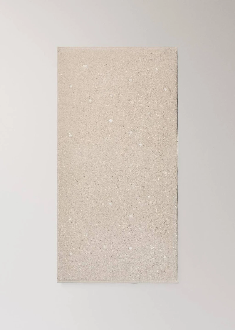 Children's bath towel with glow-in-the-dark stars