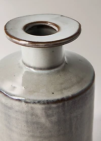Stoneware vase with bottle design