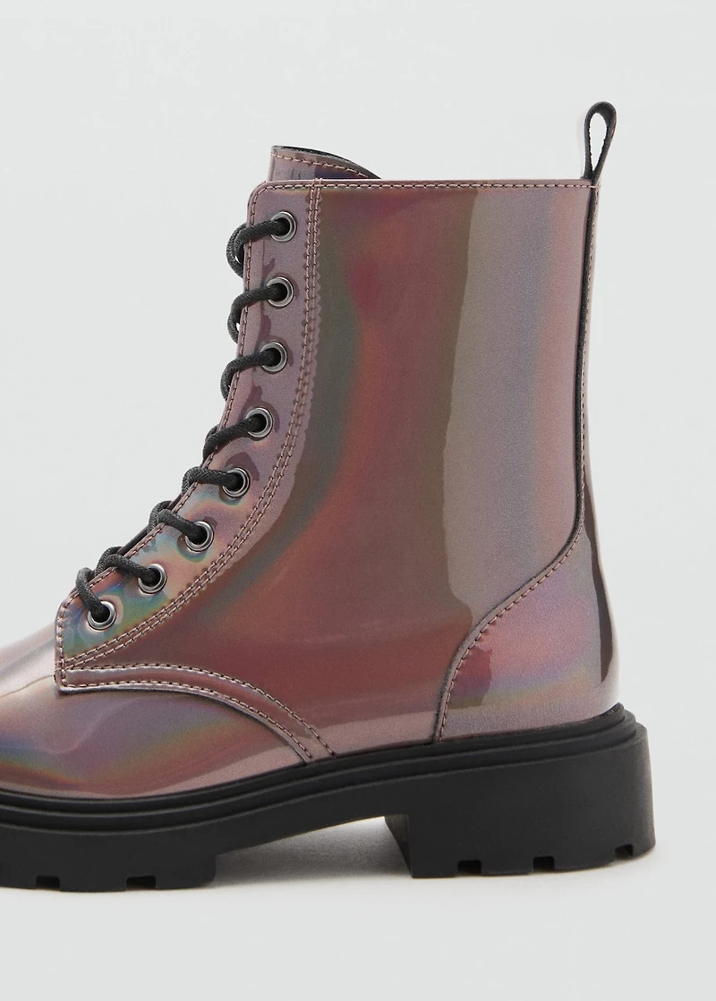 Zipped metallic boots