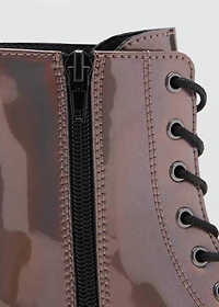 Zipped metallic boots