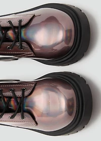 Zipped metallic boots