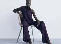 Polka-dot blouse with draped collar