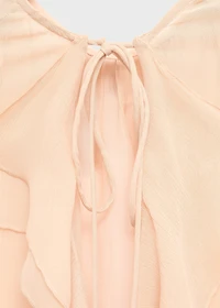 Ruffled blouse with flared sleeves