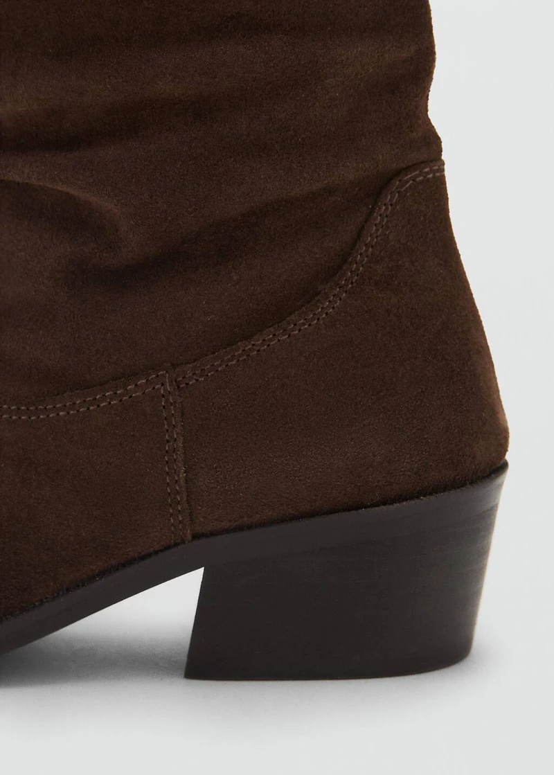 Knee-high leather boots with ruched detail