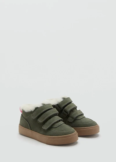 Leather and fur-effect trainers