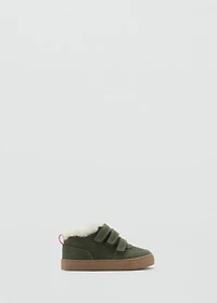 Leather and fur-effect trainers